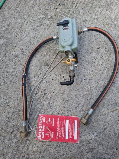 Propane switch over unit