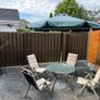 Garden Table with 4 recliner arm chairs with cushions & parasol Image 3
