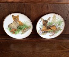 A pair of Decorative China 8 inch Wildlife picture plates fox and deer