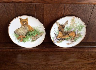 A pair of Decorative China 8 inch Wildlife picture plates fox and deer