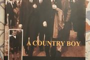 A Country Boy: Stories And Reminiscences Of A Young Man' Journey From Mullingar To 1930's Dublin by Tom Lynam