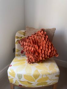 leaf and berry patterned lounge chair