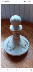 Small vintage look lidded bottle