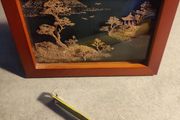An elaborate Chinese framed cork art