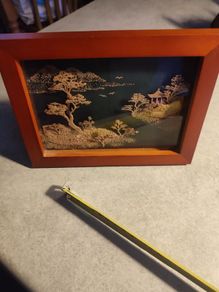 An elaborate Chinese framed cork art