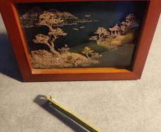 An elaborate Chinese framed cork art