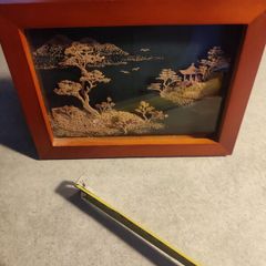 An elaborate Chinese framed cork art