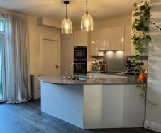 KUBE Modern High-Gloss Kitchen & AEG Appliances