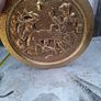 Large Brass Wall Charger Old World Pub Scene, Embossed Tavern scene of 17th-century Pubs. This is a striking brass wall hanging, with an Old World pub scene. It is pressed hammered brass. The raised relief image features a pair of men in Old World dress,  Image 3