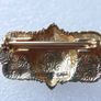 Vintage gold tone brooch with Green Faceted Stone Image 3