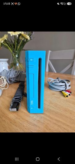 Nintendo Wi console in blue.