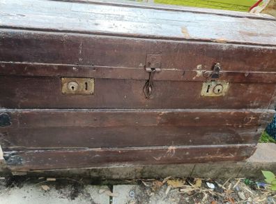 Wooden and metal domed steamer chest