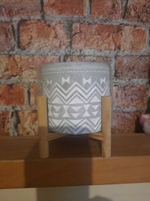 lovely candle on wooden stand