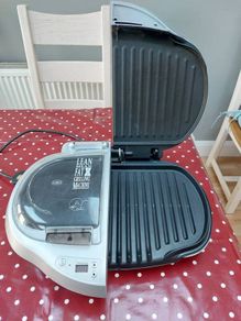 George Foreman double grills with individual timers and hot plates, working perfectly in good condition
