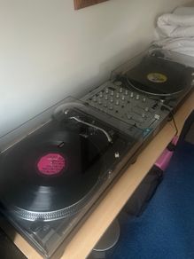 Technics 12/10s and mixer and 150 vinyl records