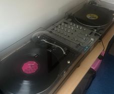 Technics 12/10s and mixer and 150 vinyl records