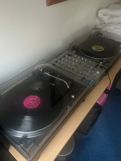 Technics 12/10s and mixer and 150 vinyl records