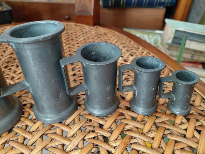 Antique French solid pewter measuring tankards Fleurs de lys complete set