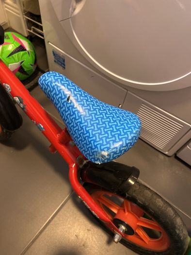 Two toddler bikes and a balance bike
