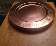 Gold/copper coloured metal plate charges