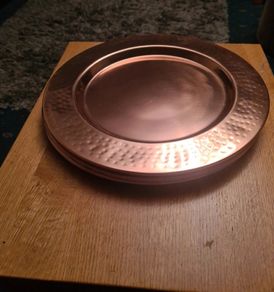 Gold/copper coloured metal plate charges