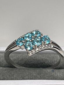Sterling silver ring with Blue Apatite and Natural Zircon.