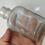 339 - Set of 2 Vintage Clear Glass Collectible Decorative Medicine Bottles Image 5