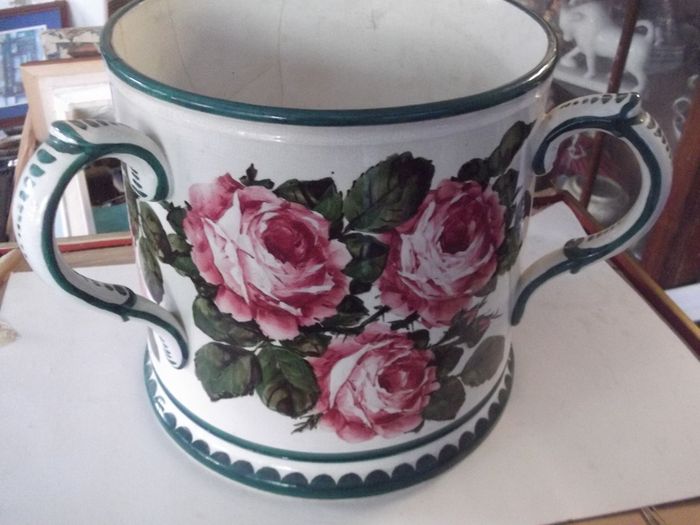 a large antique wemyss pottery ware loving cup