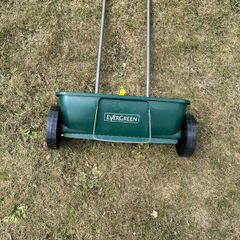 Lawn seed spreader