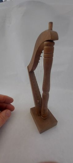 handcrafted wooden display harp ,,lovely display item for any man cave pub restaurant etc etc etc, buyer collects or pays postage.