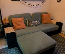 Green 3 seater sofa with matching footrest