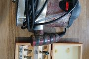 Router with bits in case