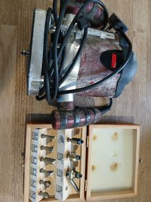 Router with bits in case