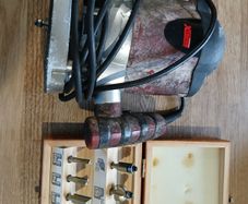 Router with bits in case