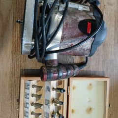 Router with bits in case