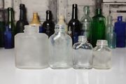 311 - Set of 4 Vintage Decorative Collectible Clear Glass Bottles