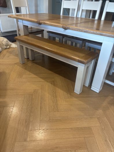 Large extendable 8 seater table with 5 chairs and a bench