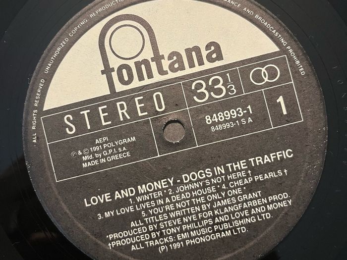 SECOND PRICE DROP! Love And Money - Dogs In The Traffic. Superb condition. Plays as new. Bargain!