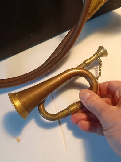 A Pair of Copper and Brass Horns