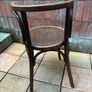 A vintage 1920s Thonet style bentwood chair with armrests. Image 3