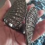 A striking wide bracelet encrusted with sparkling rhinestones. Image 6