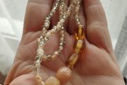 Necklace made of beads and glass beads.