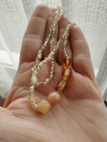 Necklace made of beads and glass beads.