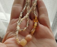 Necklace made of beads and glass beads.