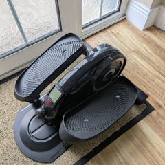 YYFITT under-desk elliptical / pedal exerciser.