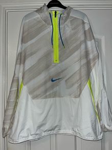 White, Blue and Yellow Nike Dri-fit Windbreaker size extra larger