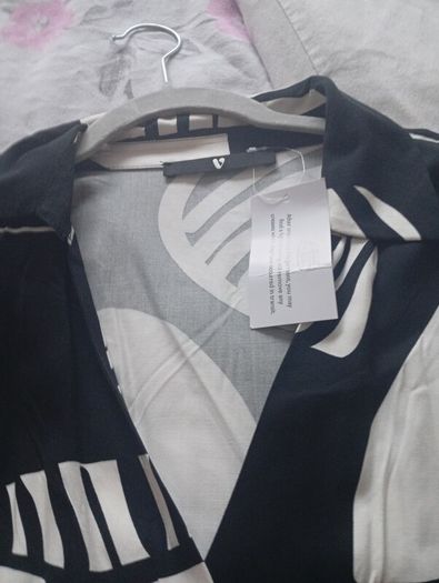 New Dress with tags very nice and dressy.