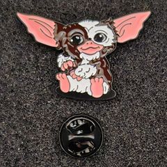 Gremlin,  pin back badge.