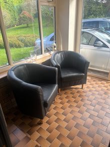 faux leather tub chairs x 2