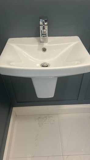 Selling two of these sinks , one with tap and one without